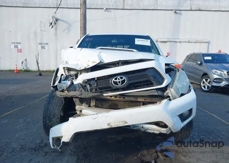 2013 Toyota Tacoma Base V6 z USA, uszkodzony, nr VIN 3TMLU4EN8DM113694